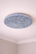 I-Lite Nordic Terrazzo Wall Sconce This I-Lite Wall Sconce features a minimalist, circular disk