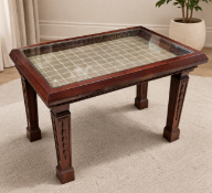 Edwardian Style Mahogany Bijouterie Table Reflecting a Neoclassical revival aesthetic, this