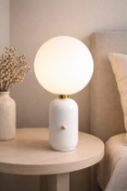 I-Lite Globe Table Lamp This I-Lite Table Lamp features a modern, minimalist silhouette with a