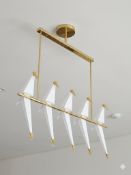 I-Lite Perch-Inspired Gold and White Parrot Pendant This I-Lite Pendant Lamp is a poetic
