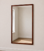 A large cherrywood framed mirror featuring a substantial rectangular mirror plate within a