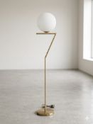I-Lite IC-Inspired Gold Floor Lamp This I-Lite Floor Lamp is a poetic architectural piece inspired