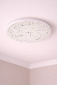 I-Lite Nordic Terrazzo Wall Sconce This I-Lite Wall Sconce features a minimalist, circular disk