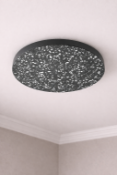 I-Lite Nordic Terrazzo Wall Sconce This I-Lite Wall Sconce features a minimalist, circular disk