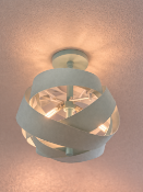 I-Lite sculptural pendant lamp features a dynamic, multi-tiered 