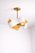 I-Lite Pendant Lamp features a modern, sculptural design with interlocking metal 