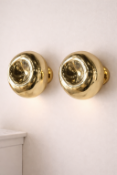 Pair I-Lite Melt-Inspired Gold Surface Wall Sconce. This I-Lite Wall Lamp is a mesmerising
