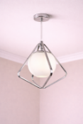 I-Lite Jack O'Lantern Inspired Silver Pendant Lamp. This I-Lite Pendant Lamp is an architectural