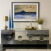 Reflect Sideboard A striking fusion of surrealist art and functional cabinetry, this large four-door