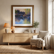 A contemporary framed print of an impressionist-style landscape painting, depicting a wooded