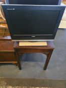 A Toshiba 20HLV16 LCD TV with integrated DVD player, featuring a 20-inch screen and a silver-tone