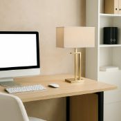 Bauhaus Table Lamp The Bauhaus Table Lamp is a study in linear precision and geometric balance,