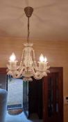 Elegant Clear Crystal ChandelierFive candle style lights on this elegant clear crystal chandelier