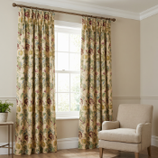 A pair of full-length curtains in a traditional floral style, featuring a complex pattern of large