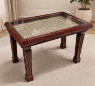 Edwardian Style Mahogany Bijouterie Table Reflecting a Neoclassical revival aesthetic, this
