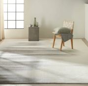Calvin Klein Holsi Rug The Calvin Klein Holsi Rug features painterly brush-stroke effects that