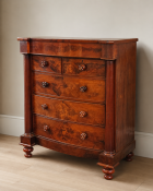 A substantial early 19th-century William IV / early Victorian style mahogany bow-fronted chest of