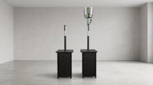 A pair of contemporary gas patio heaters, designed with decorative all-weather synthetic wicker