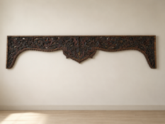 A striking pair of late 19th or early 20th-century hand-carved hardwood architectural panels from