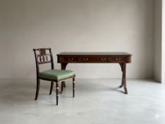 A mahogany sofa-style writing desk of Regency design, offered as a suite with a matching Regency