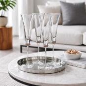 Champagne Flutes – Set of 4. A matching collection of ultra-clear, long-stemmed crystal champagne
