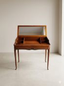 A contemporary French cherry wood vanity dressing table by the premium maker Brigitte Forestier. The
