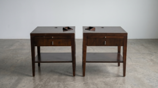 A pair of contemporary bedside tables or nightstands designed in the stylish manner of the Liang &