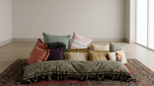 A selection of 14 luxury scatter cushions accompanied by 1 matching long bench or daybed bolster