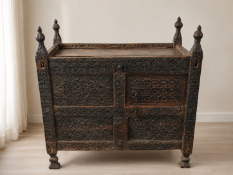 An exceptionally large and imposing 18th/19th-century hand-carved hardwood dowry chest (pitar)