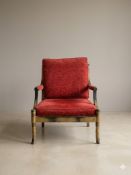 A stylish mid-century modern or Hollywood Regency style blonde oak faux-bamboo open armchair,