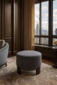 Albany Ottoman. A generous, minimalist storage ottoman wrapped in a durable, heavily textured