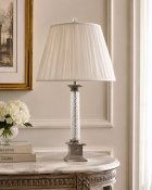A French Empire Style Corinthian Column Glass and Nickel Table Lamp An elegant table lamp designed
