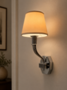 A Pair of Art Deco Style Single-Arm Wall Sconces in Polished Nickel A high-end pair of designer