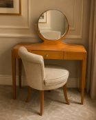 An Art Deco Style Maple Dressing Table, Integrated Mirror, and Chair Set by Francesco Molon A high-