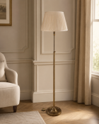 A Neoclassical Style Antique Brass Swing-Arm Library / Floor Lamp The library standard lamp features