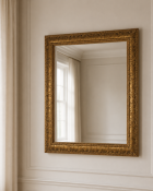 A Contemporary Giltwood Square Wall Mirror The vanity wall mirror features a square bevelled glass