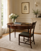 A Regency Style Mahogany Oval Writing Table and Coordinating Hepplewhite Style Shield-Back Chair The