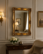 A Louis XV Style Composition Wall Mirror An elegant, rectangular wall mirror executed in the
