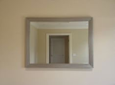 A large contemporary silver mirror A sophisticated Art Deco-inspired stepped wood frame finished
