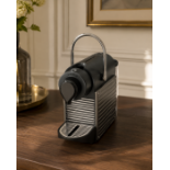 A Nespresso "Pixie" Coffee Pod Machine by Krups A contemporary capsule coffee machine in the compact