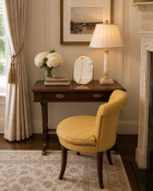 A William IV Style Mahogany Writing Desk and Accompanying Tub Chair The desk features a