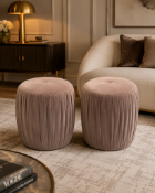 A pair of Contemporary Pleated Velvet Cylinder Pouffe A compact, circular upholstered pouffe or