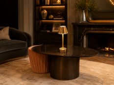 Contemporary Granite-Top Ovoid Coffee Table features an ovoid (elliptical) top crafted from high-