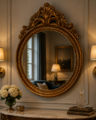 Ornate Victorian-Style Gilt Oval Wall Mirror A fine, oval wall mirror of classic proportions,