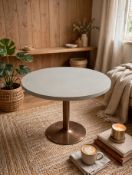 A commercial salvage pallet containing twenty grey circular leather-clad table tops, noted as