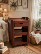 A functional multi-tiered wooden room service trolley, featuring an open drop-in tier