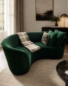A contemporary forest green crescent-shaped curved sofa, expertly upholstered in premium velvet from