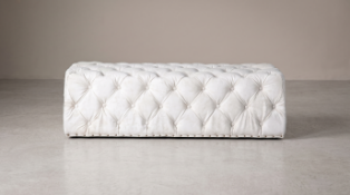 Timothy Oulton Lord Digsby Rectangular Large Footstool in Vintage Bianco is a grand statement of