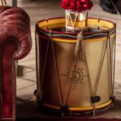 Timothy Oulton Regiment Drum Side Table in Painted Wood is a bold, conversational piece steeped in