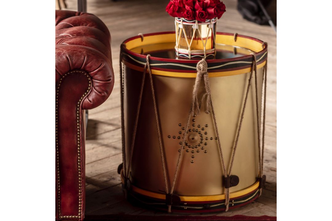 Timothy Oulton Regiment Drum Side Table in Painted Wood is a bold, conversational piece steeped in - Image 1 of 2